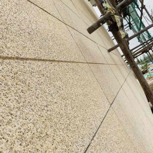 佳木斯 黄金麻花岗岩荔枝面外墙干挂石材效果示例